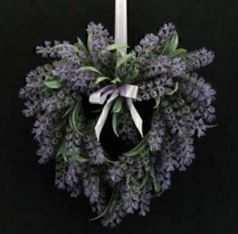 Artificial lavender heart wreath decoration. With lilac ribbon hanger would make a great new home gift or a birthday gift. Size 20x27x7cm